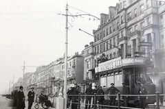 A-photo-of-a-tram-opposite-the-Grand-Hotel-on-the-wire-and-not-the-studs.-1912.